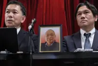 Japan bereaved family sues over 'hostage justice'