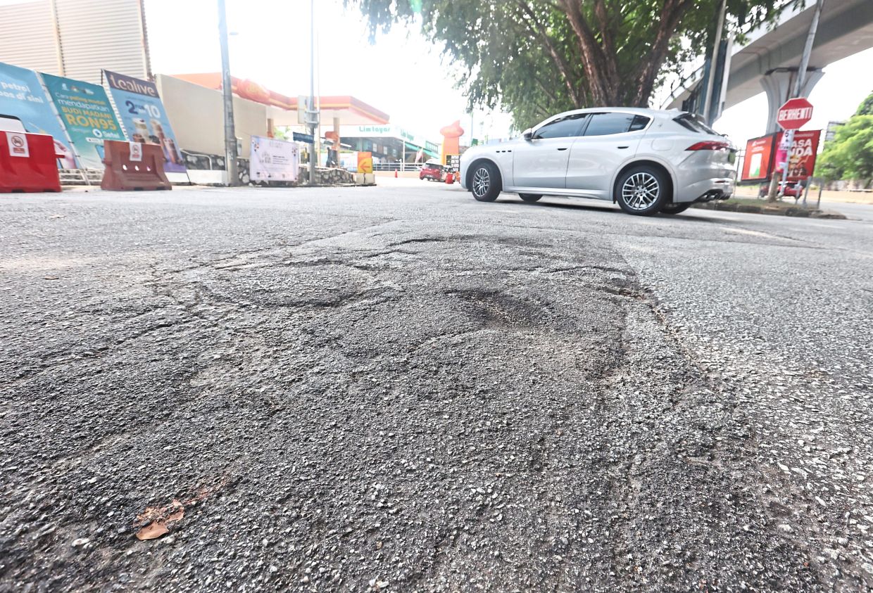 Uneven road surface along Jalan Damansara near the Petronas station junction of Taman Tun Dr Ismail, Kuala Lumpur.