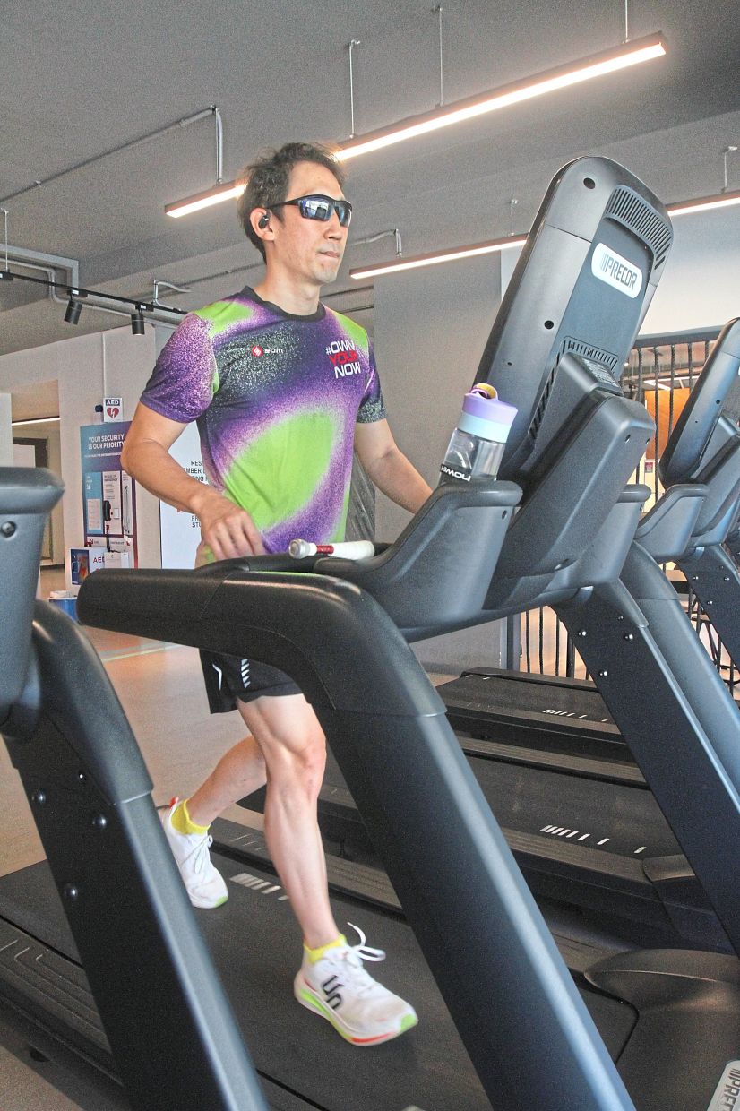 Despite the odds: Yuen training hard for the triathlon on April 12. — LIM BENG TATT/The Star 