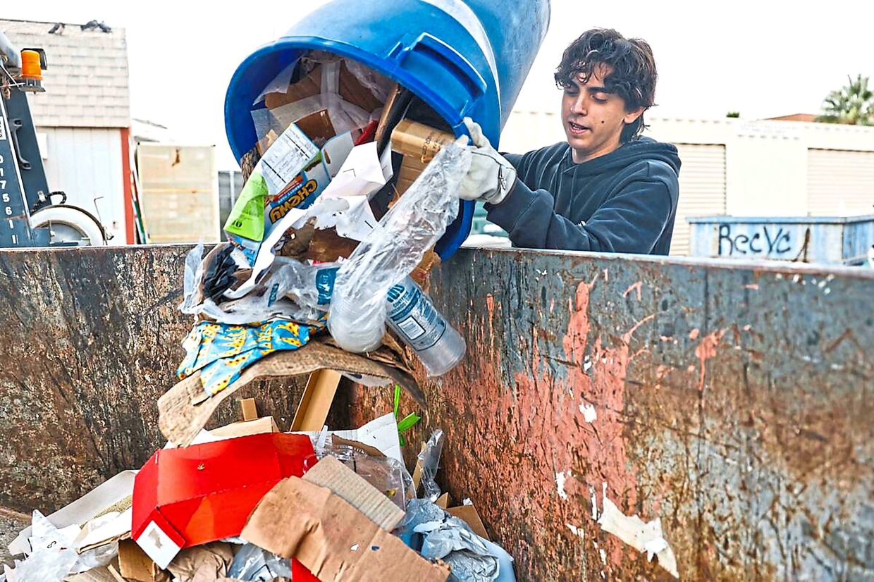 Aldo Amichel working at the Rebel Recycling building at UNLV.