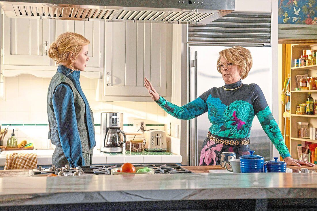 'Sure, this isn't as flamboyant as my other outfits, but it's the only one that can see print in a family newspaper.'