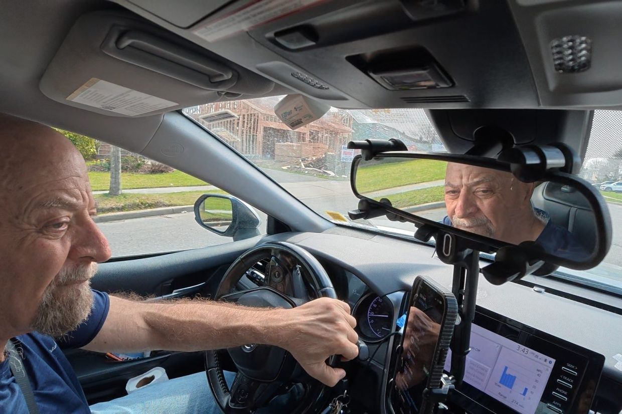 Goldberg prepares to pick up passengers for Uber near Plainview, New York. Some seniors are finding gig work, or contract jobs, through apps or digital platforms. — AP