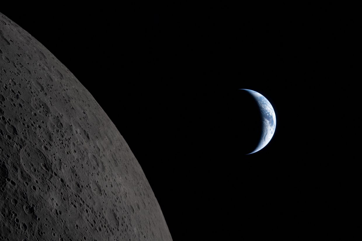 NASA releases picture of 'Earthset' shot by Artemis crew | The Star