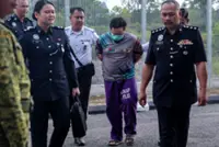 Trailer driver charged with murder of three in Segamat crash