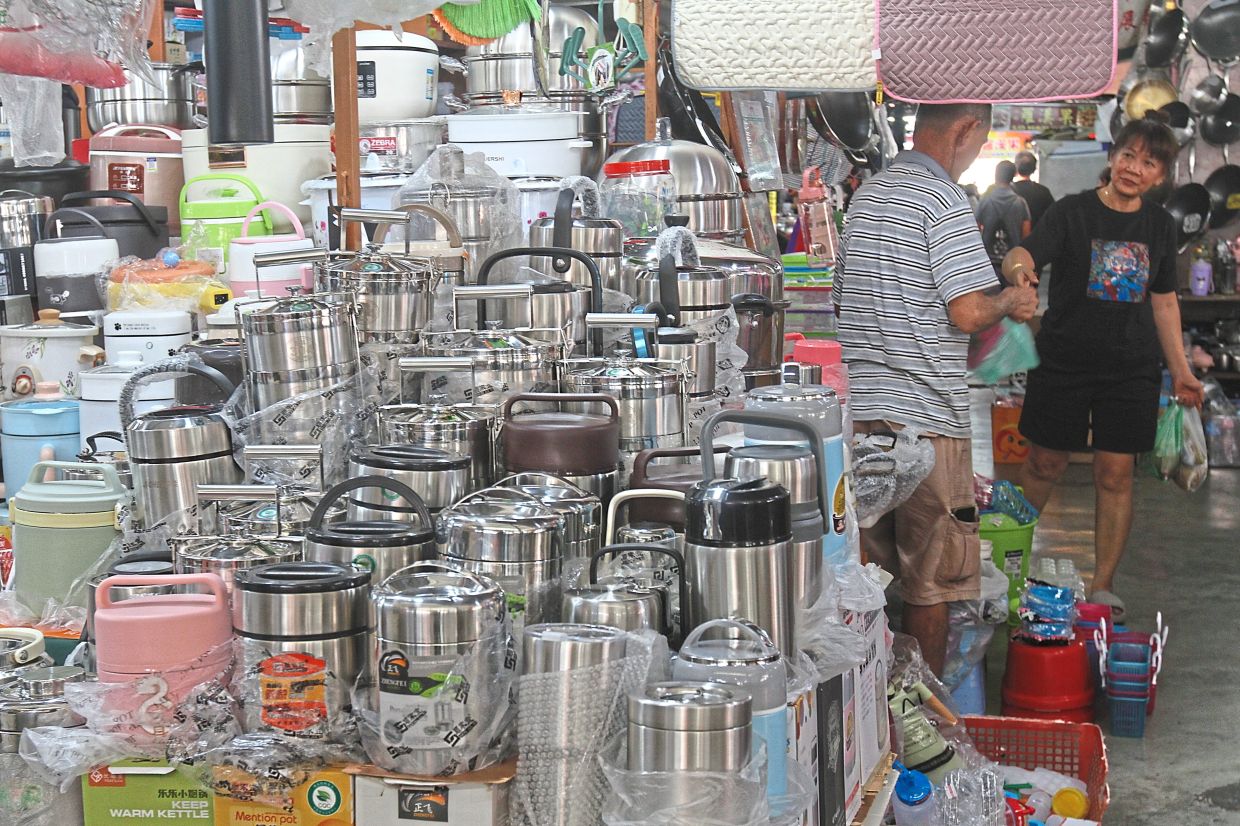 Afternoon markets in Penang, like the one in Lebuh Cecil, offer everyday essentials besides fresh produce.