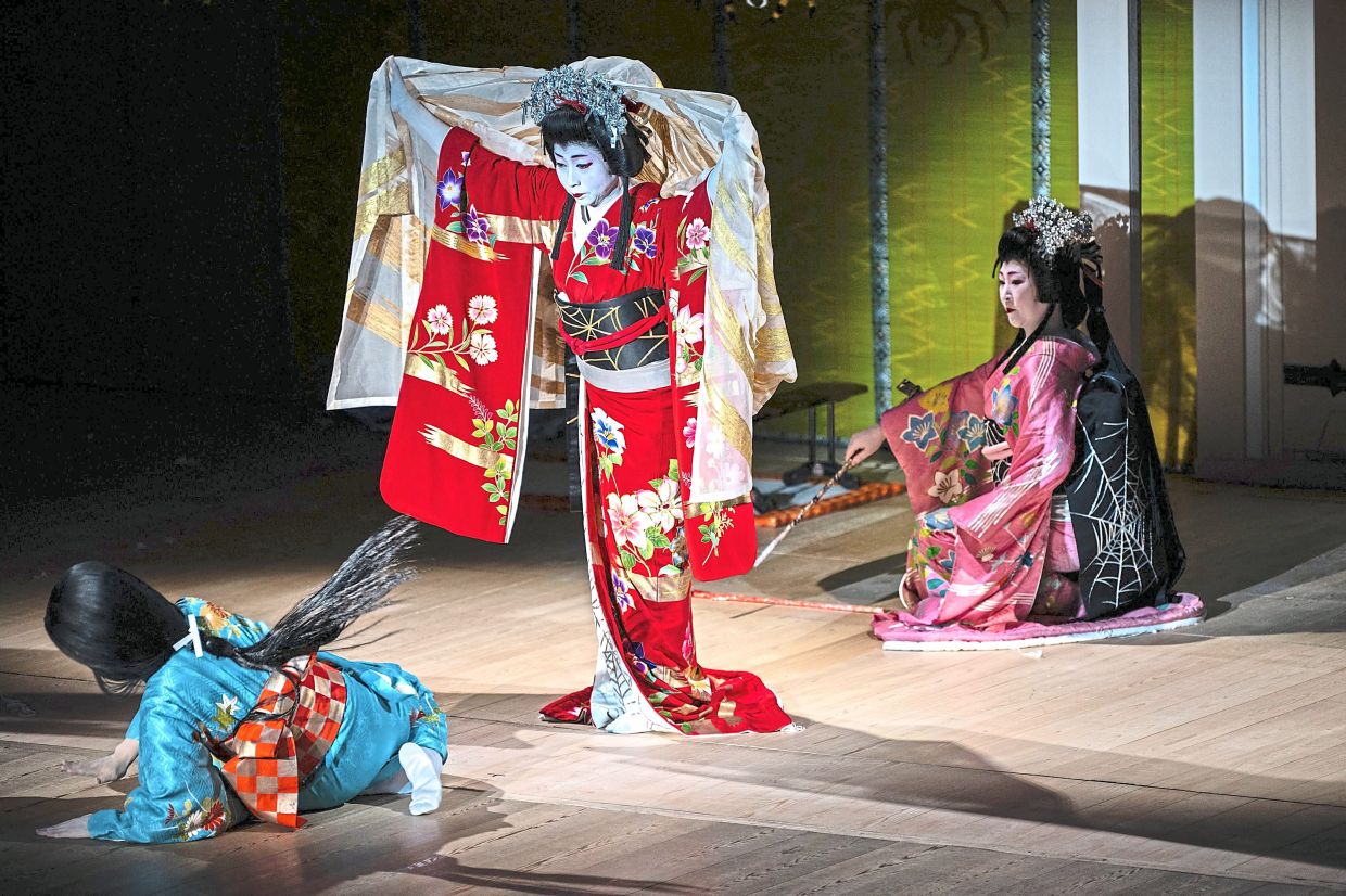 Rare look: Geisha and maiko taking part in a rehearsal for the annual Miyako Odori at the Gion Kobu Kaburenjo and (below) geisha and maiko taking part in a press interview ahead of a rehearsal for the annual Miyako Odori. — AFP 
