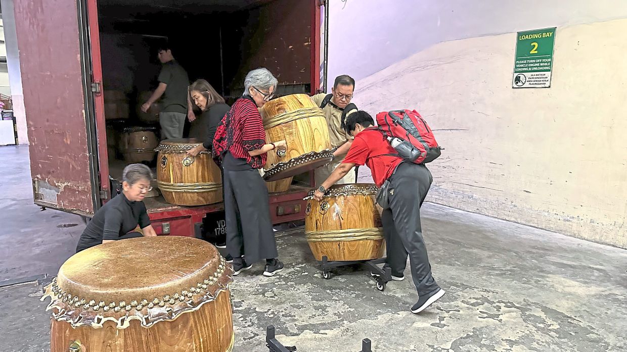 More than just performers, the team works together to set up and pack away the drums before and after each show. — DrumBeatz