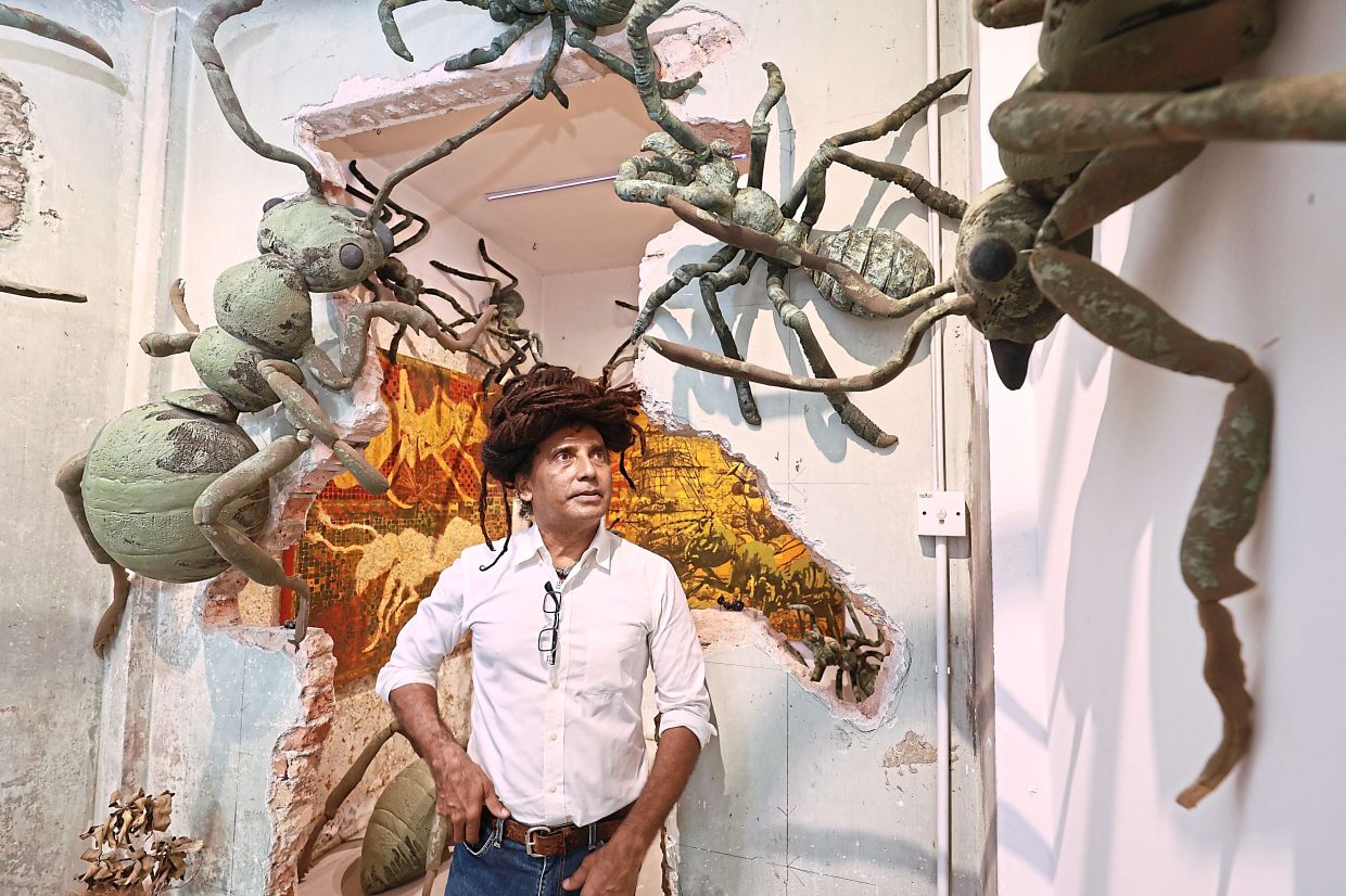 Sivarajah with his larger-than-life installations reframing the ant as a symbol of environmental balance.