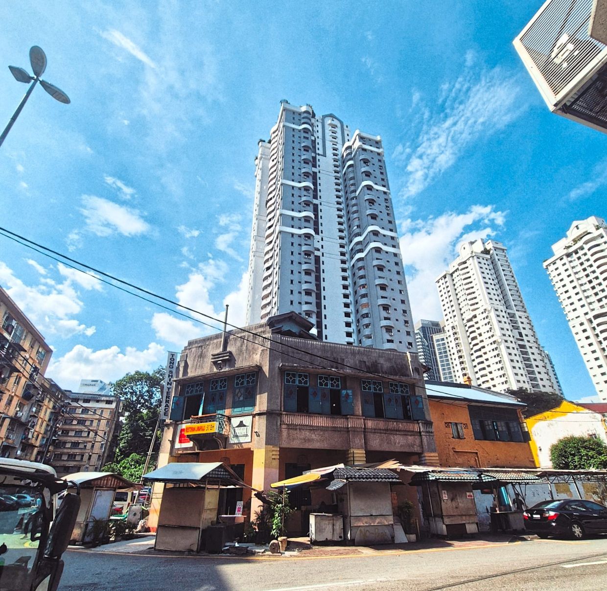 The unassuming Tong Shin Terrace as seen from the street – dwarfed in size but not in spirit.