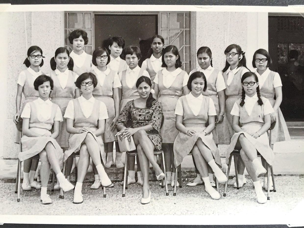 Photo taken in 1968 with art teacher Dolly at the Pudu English Secondary School.