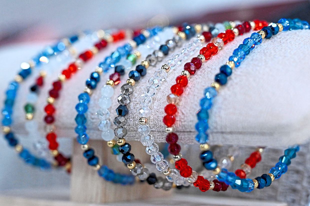 The brand offers rings, bracelets and phone straps made from glass as an economical alternative to crystals. 