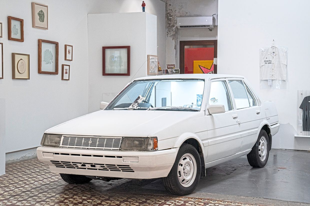 The exhibition features more than 20 local and international artists working across painting, sculpture, photography, installation, and print.