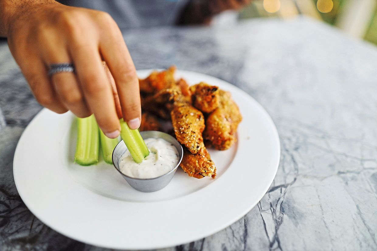 Buffalo wings were created in Buffalo, New York, to make use of an extra shipment of chicken wings. — JULIA AVAMOTIVE/Pexels 