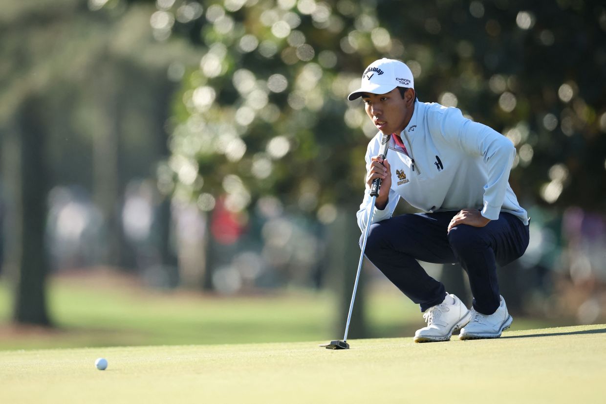 Amateur Fifa Laopakdee of Thailand looks over a putt on the first hole during the second round of the 2026 Masters Tournament at Augusta National Golf Club on Friday, April 10, 2026, in Augusta, Georgia. -- Hector Vivas/Getty Images/AFP