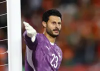 Soccer-Al-Ahly keeper El-Shenawy banned four games for striking referee