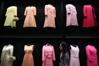 Queen Elizabeth II’s wardrobe takes the spotlight in landmark style show