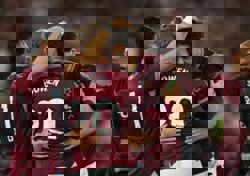 Soccer-West Ham out of relegation zone with 4-0 win over Wolves