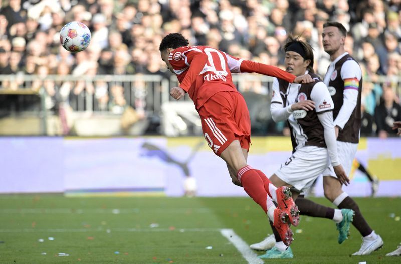 Jamal Musiala headed ⁠in from close range after nine ⁠minutes ‌as the visitors matched the record haul from Bayern's ⁠1971/72 campaign of 101 goals.