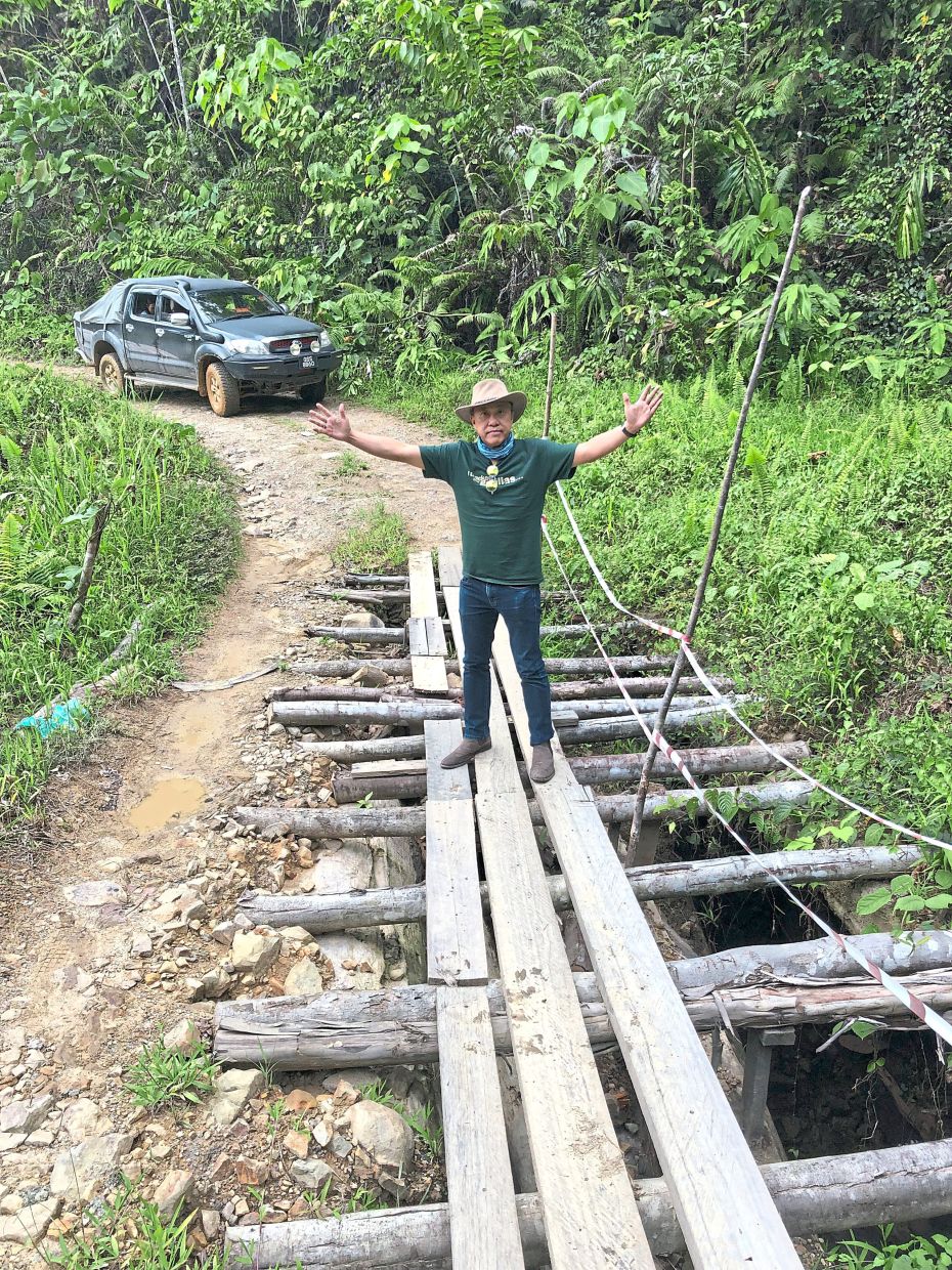 On a logging truck road in Belaga, where a regular car cannot go through. 