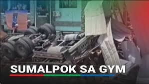 The incident occurred shortly after 10 a.m. when a tire on the 10-wheeler truck burst, causing the driver to lose control of the vehicle.