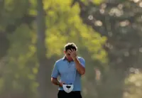 Golf-McIlroy's Masters cruise hits the skids at Amen Corner