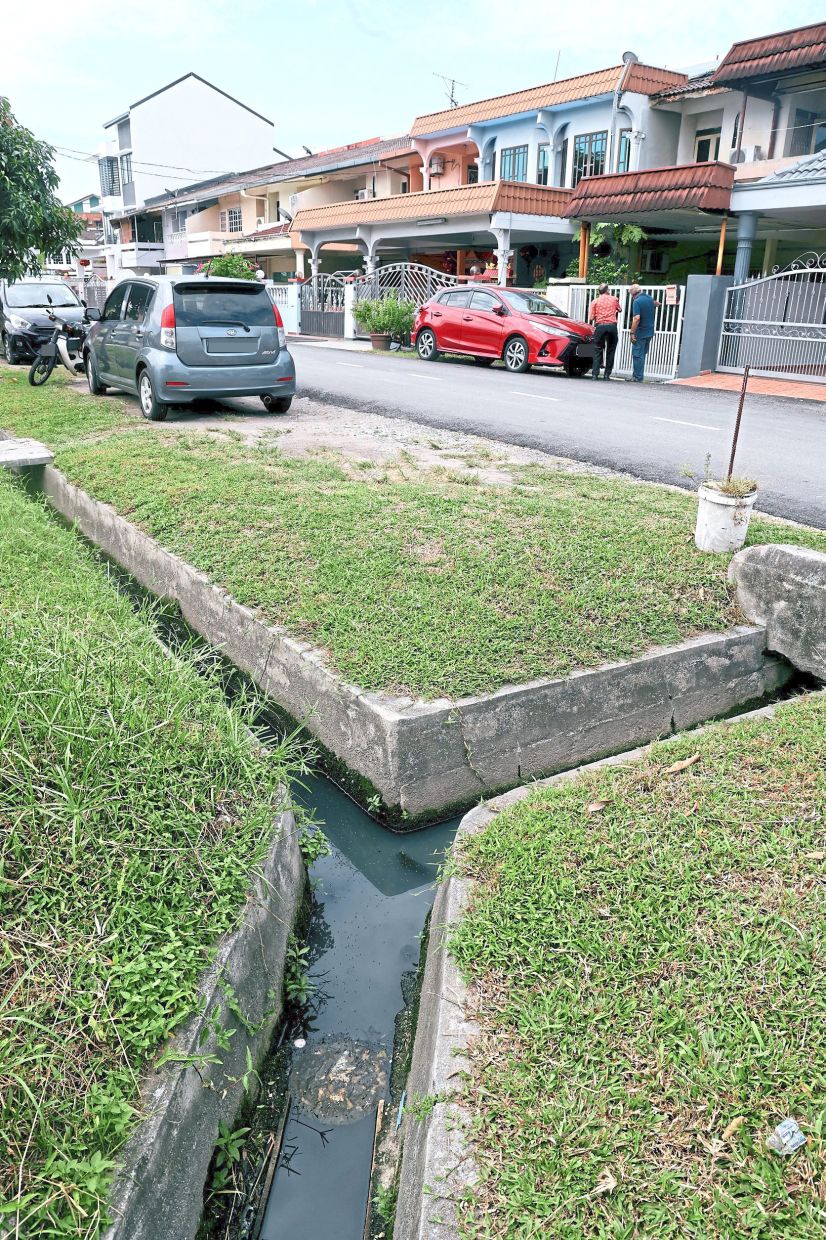 The drainage system at Jalan Prai 3, Taman Meru off Jalan Meru needs to be widened to accommodate heavy rains. — Photos: KK SHAM/The Star