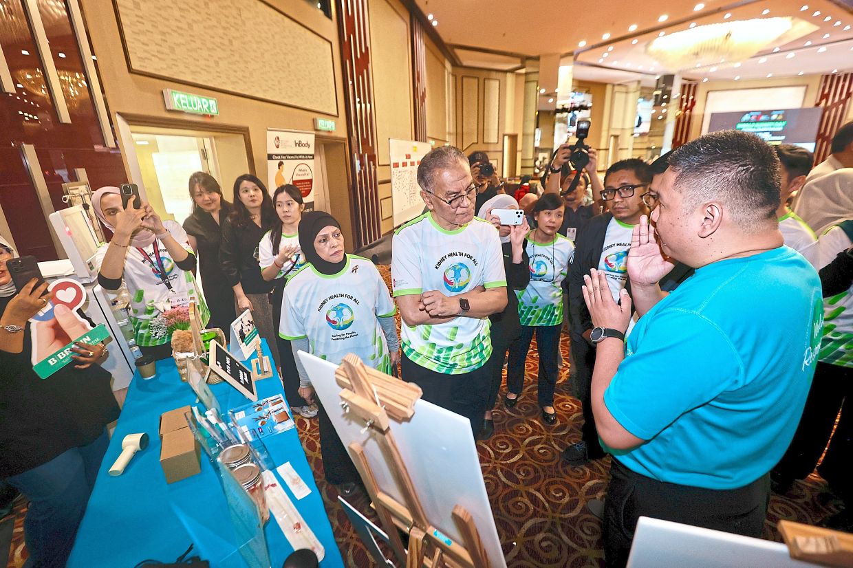 Your health is in your hands: Dzulkefly (centre) making a visit to the healthcare booths in conjunction with World Kidney Day 2026 at Wisma MBSA, Shah Alam. — FAIHAN GHANI/The Star