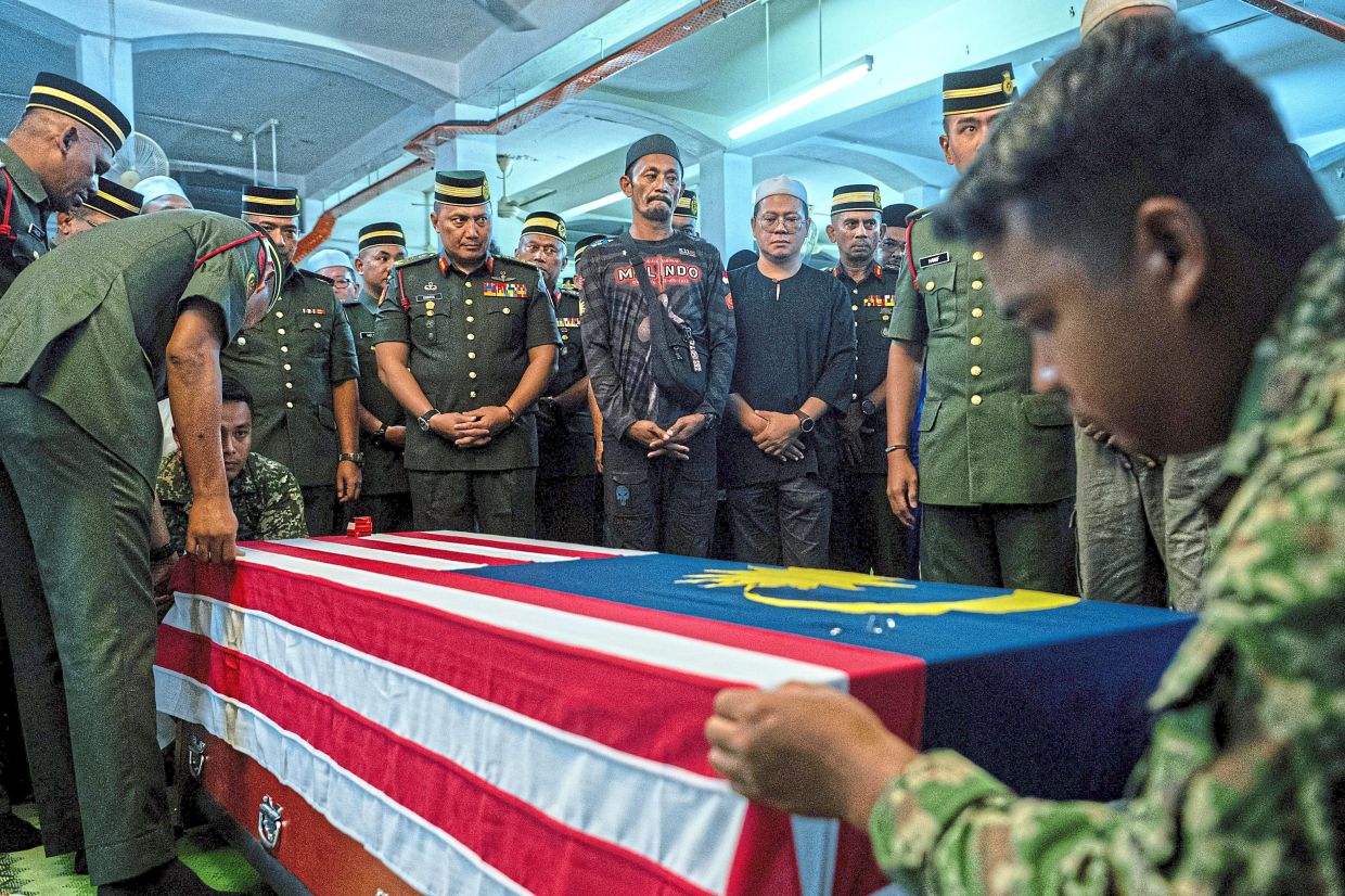 Malaysian Army soldier Prebet Muhammad Amirul Raziq Rosafindi, who died after being allegedly beaten by an Army corporal last month, has been laid to rest in Negri Sembilan.