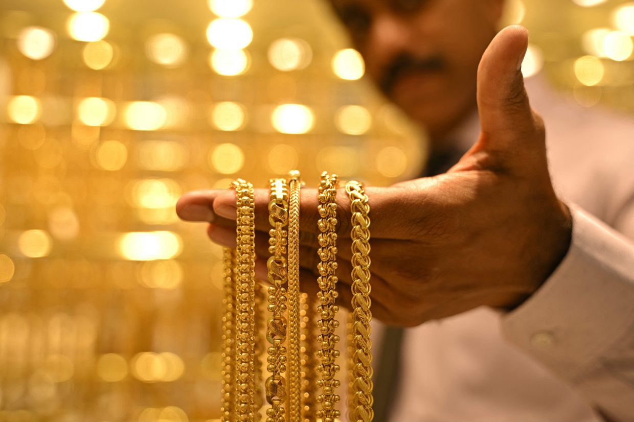 Spot gold was down 0.4% at $4,726.64 per ounce, as of 0620 GMT, after hitting its lowest since April 7 earlier in the day at $4,643. U.S. gold futures for June delivery fell 0.8% to $4,748.70.
