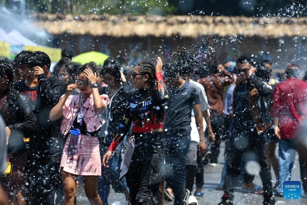 People take part in celebrations of the Thingyan water festival in Yangon, Myanmar, April 13, 2026. -- Xinhua/Myo Kyaw Soe