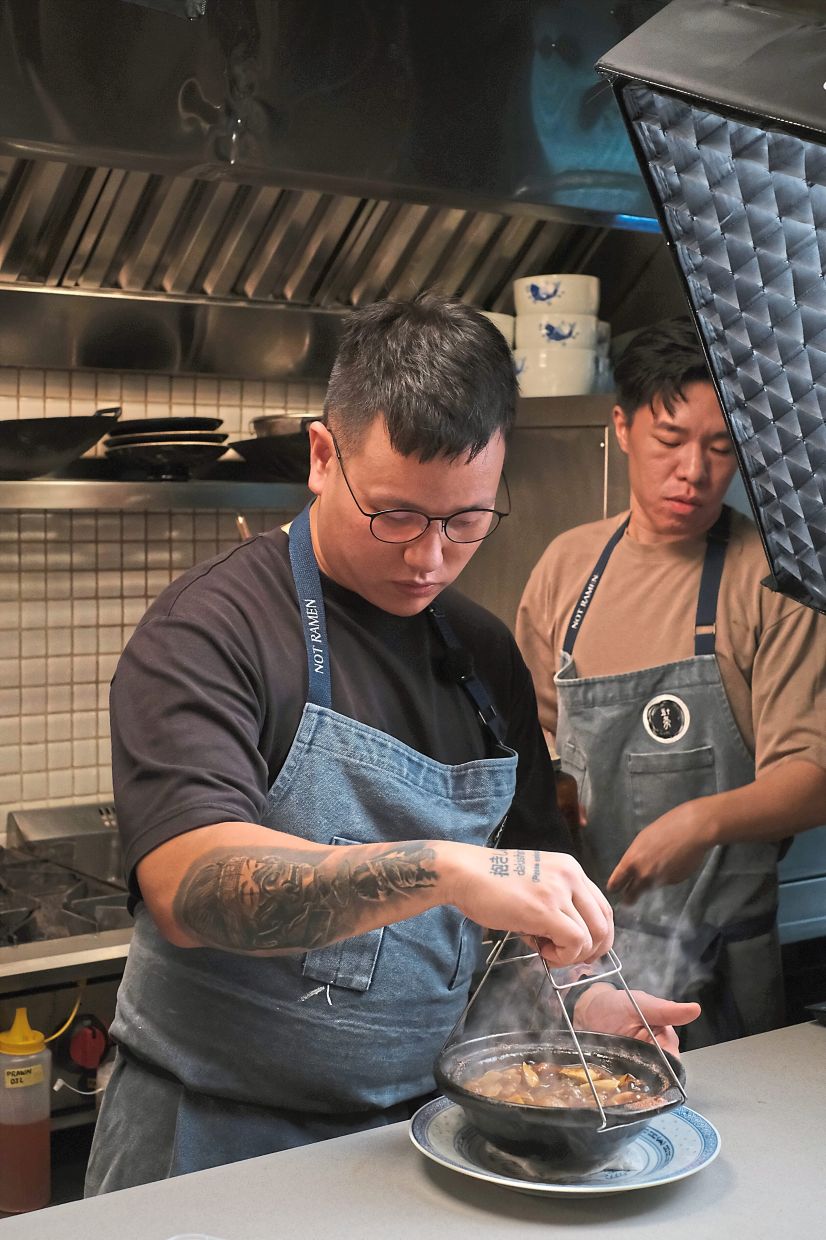 Khor (left) was left severely depressed after tough experiences in previous restaurants he worked in, which is why he has worked hard to create a safe space for his own team at Fifty Tales. — Fifty Tales