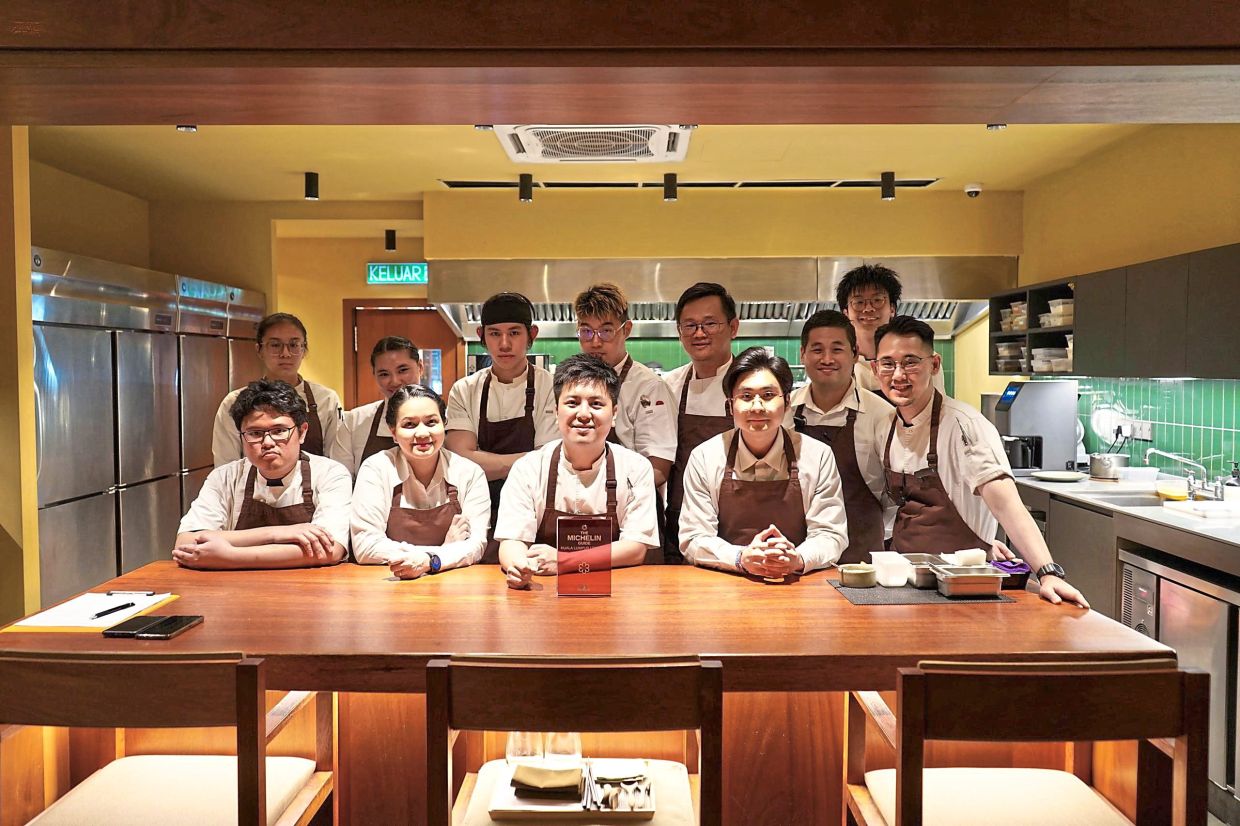 YC (front row, centre) is very chilled out in his kitchen and believes that his staff shouldn’t have to operate at 100% every day, as that is too stressful. — Terra Dining