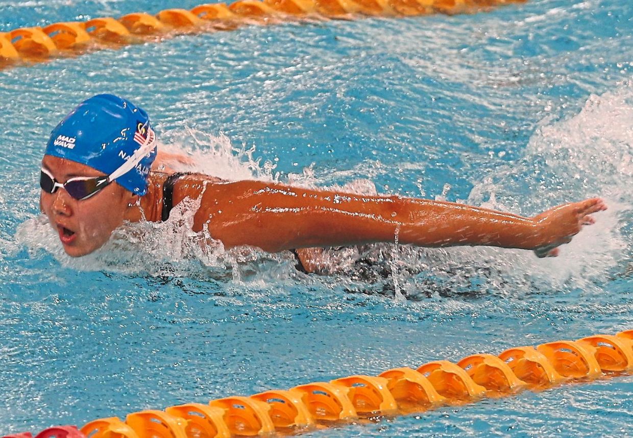 Rising star: Perak’s Nadia Lim stealing the show in the 200m individual medley final.