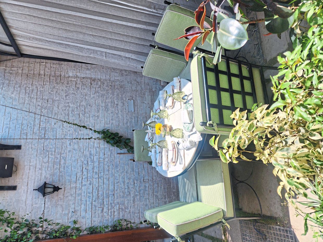 The restaurant is moulded on Rajan's grandfather's heritage home and even has a dedicated garden and courtyard area. — ABIRAMI DURAI/The Star