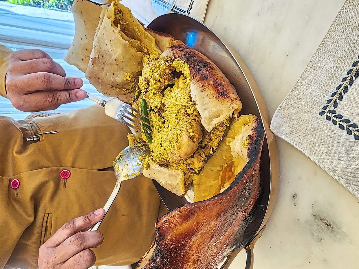 Atta chicken is one of the special dishes on the menu that is crafted by placing chicken in a dough ball and cooking it slowly in a tandoor oven.