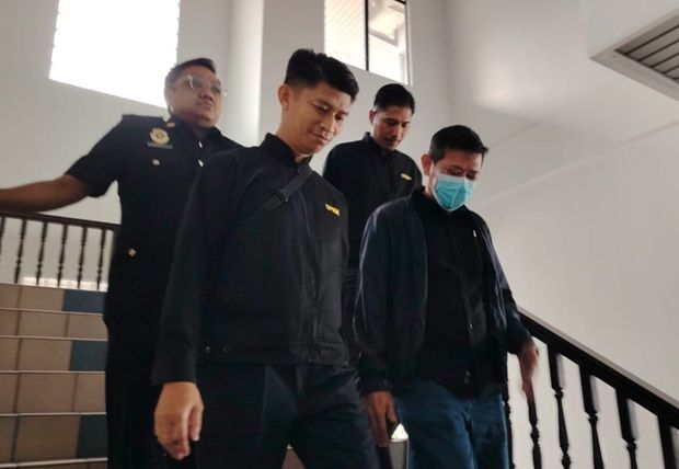 A former administrative manager of Melaka Halal Hub claimed trial at the Sessions Court Melaka to two charges of accepting insurance commissions amounting to more than RM2,000 as bribes.