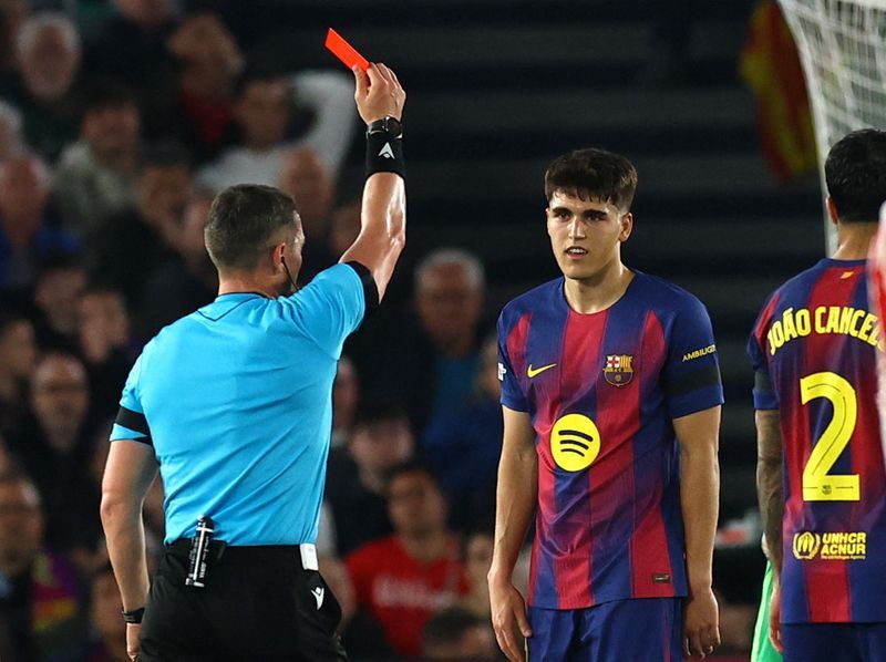 Barcelona appealed for a ​penalty after Atletico goalkeeper Juan ⁠Musso appeared to put the ball back into play from ⁠a goal ‌kick before defender Marc Pubill handled it inside the six-yard area ⁠to retake it.