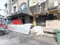 Drains choked with grime, rodents