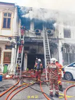Veteran lawyer, clerk killed in George Town blaze