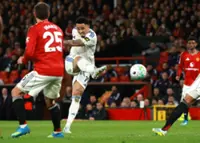 Soccer-Leeds grab 2-1 win over Manchester United as Martinez sees red