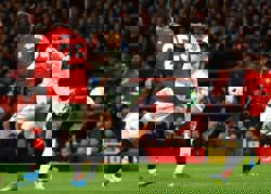 Soccer-Leeds grab 2-1 win over Manchester United as Martinez sees red