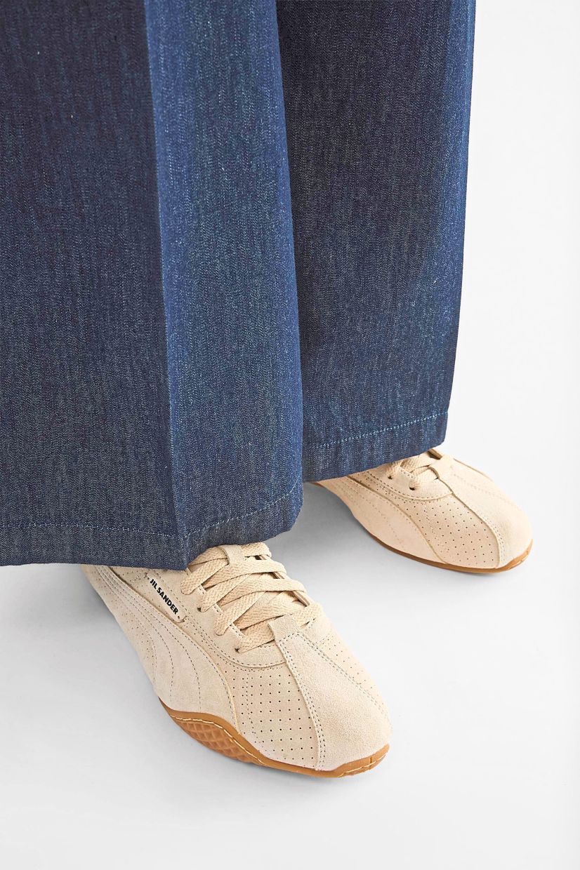 Materials like suede can elevate a sneaker into something more refined. Photo: Jil Sander