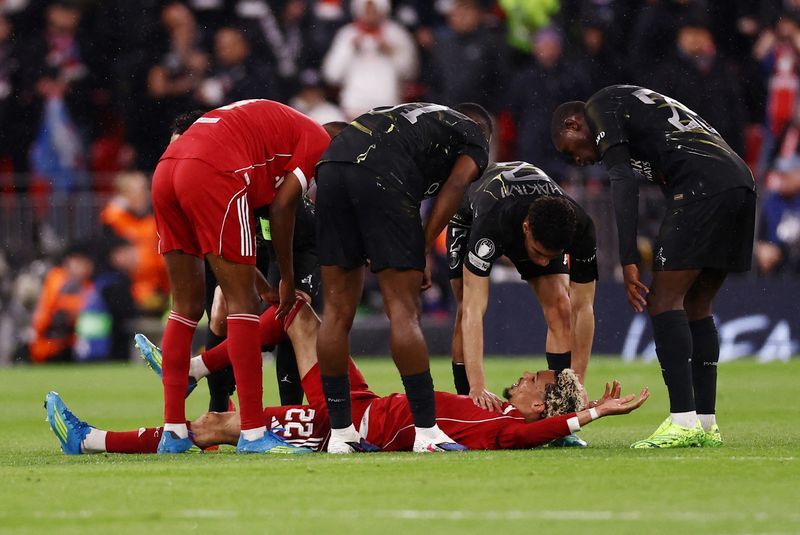 Ekitike pointed ⁠to ‌his Achilles tendon as medical staff attended to ⁠him before he was carried off ​on ‌a stretcher at Anfield, where ⁠Liverpool lost ​2-0 in their quarter-final second leg, exiting the competition with a ⁠4-0 aggregate defeat.