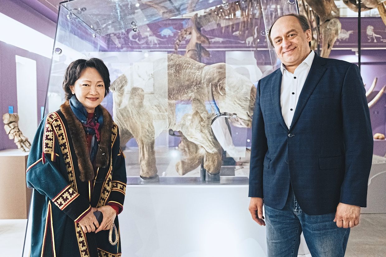 The writer (left) with Podoroga at the Shemanovsky Yamal-Nenets Museum and Exhibition Complex, to see Lubya the baby mammoth.