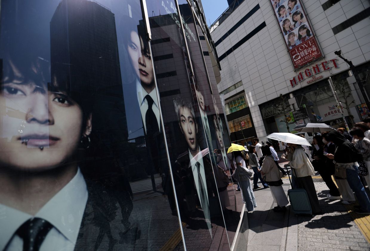 Prosecutors said he fraudulently obtained 750 million won from the victims under the pretext of acquiring a company, which he alleged was already producing and selling BTS-themed merchandise such as slippers.