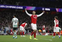 Soccer-Arsenal scrape past Sporting to reach Champions League semi-finals