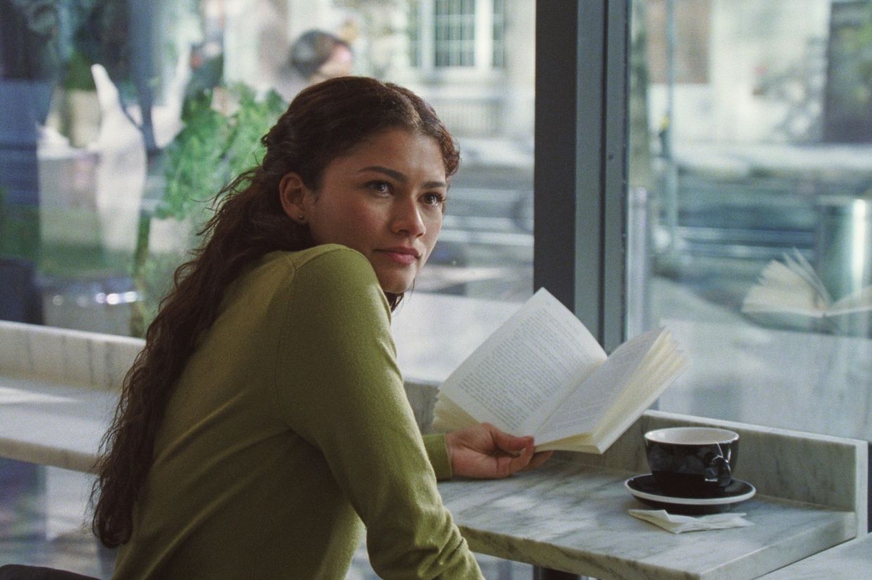 No laptop, smartphone or headphones in sight? This has to be a fake cafe.