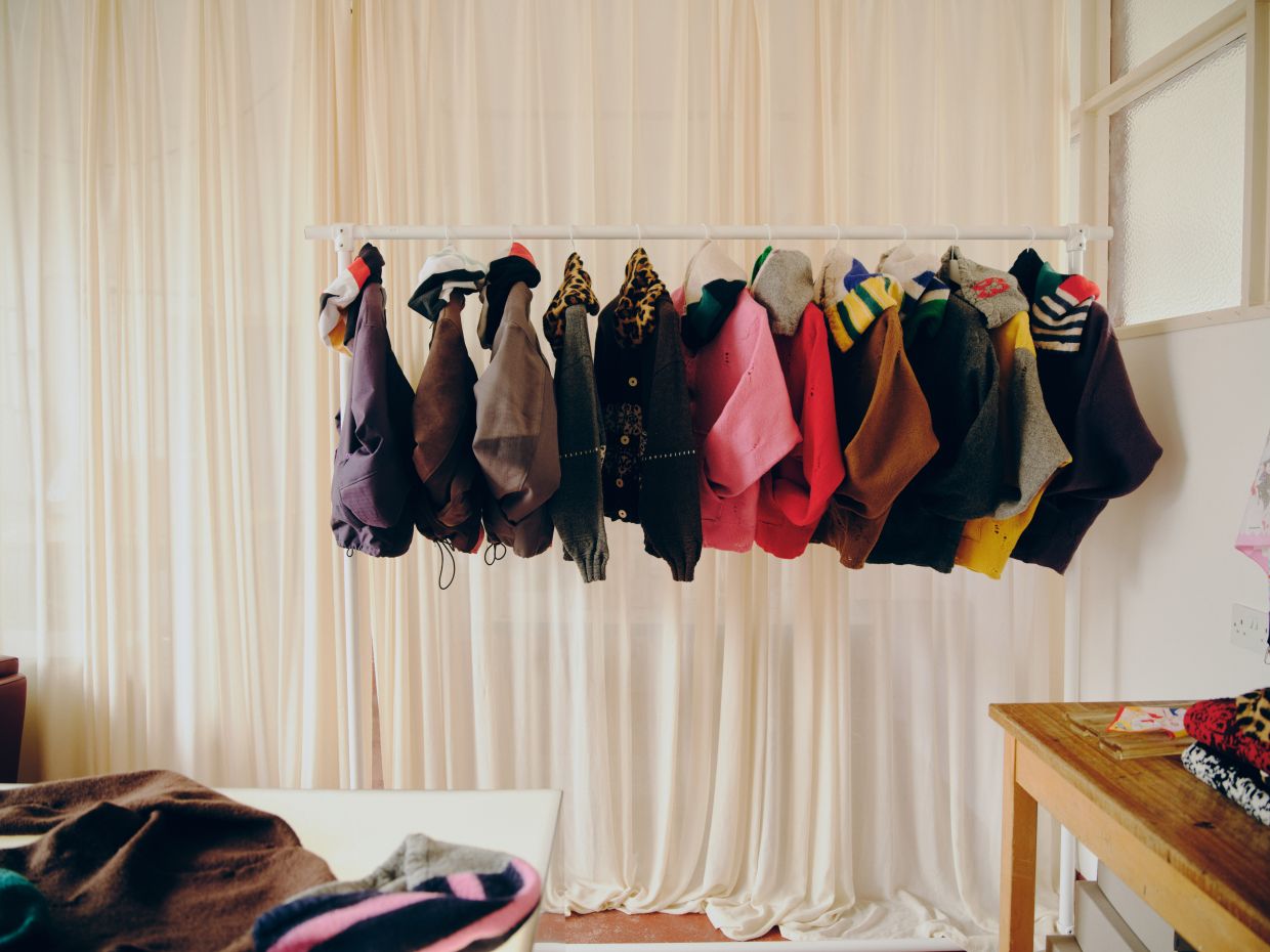 Work jackets designed by Jake Burt, with contrasting hoods in leopard print and stripes, at Jake’s, his small shop off Victoria Park in London. Photo: The New York Times
