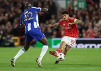 Soccer-Forest edge 10-man Porto to secure Villa showdown