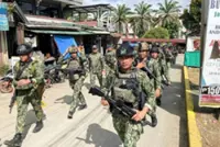 Philippines forces kill 10 Islamist militants in arrest gunfight